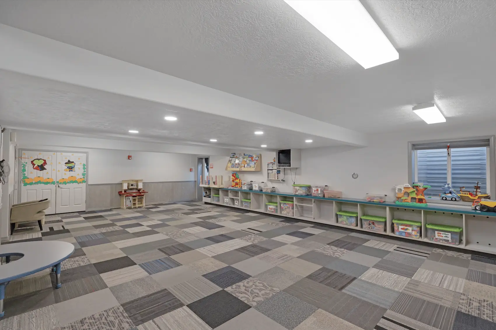 Indoor play area for kiddos inside Lorraines Daycare
